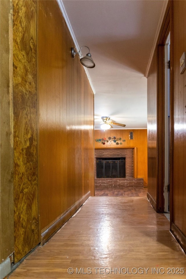 519 N 15th St, Muskogee, OK 74401 - hallway featuring wood walls and wood finished floors
