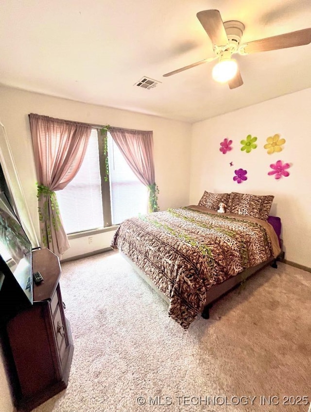 519 N 15th St, Muskogee, OK 74401 - bedroom featuring light colored carpet and ceiling fan
