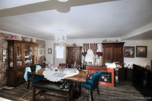 638 W Main St, Caney, OK 74533 - dining area featuring a chandelier, dark wood-style floors, and crown molding