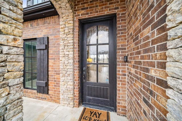 7003 E 88th St N, Owasso, OK 74055 - entrance to property featuring brick siding