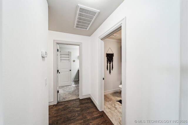 7003 E 88th St N, Owasso, OK 74055 - corridor featuring baseboards and wood finished floors