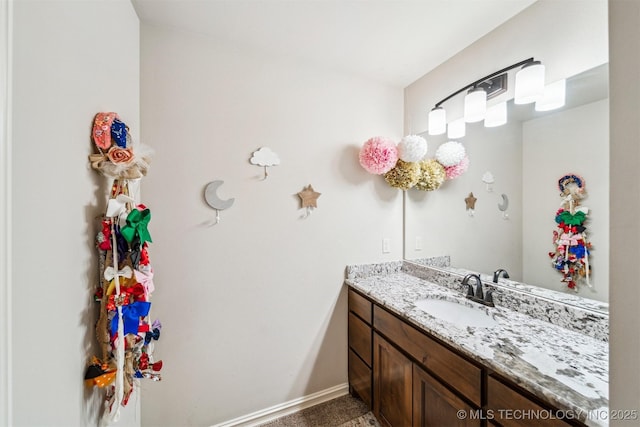 7003 E 88th St N, Owasso, OK 74055 - bathroom with vanity and baseboards