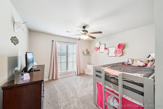 7003 E 88th St N, Owasso, OK 74055 - bedroom featuring light colored carpet and a ceiling fan