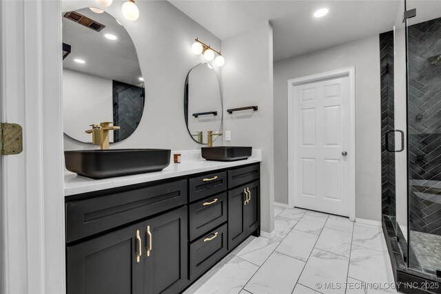 14900 E 88th St N, Owasso, OK 74055 - bathroom featuring double vanity, marble look tiles, a stall shower, and recessed lighting