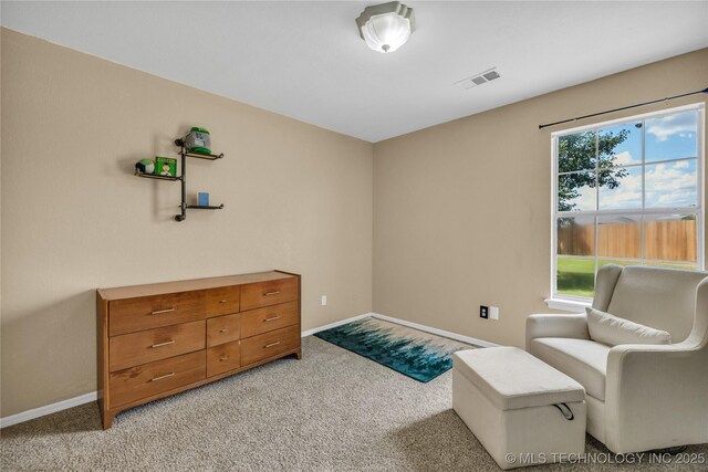 14900 E 88th St N, Owasso, OK 74055 - living area featuring light carpet and baseboards