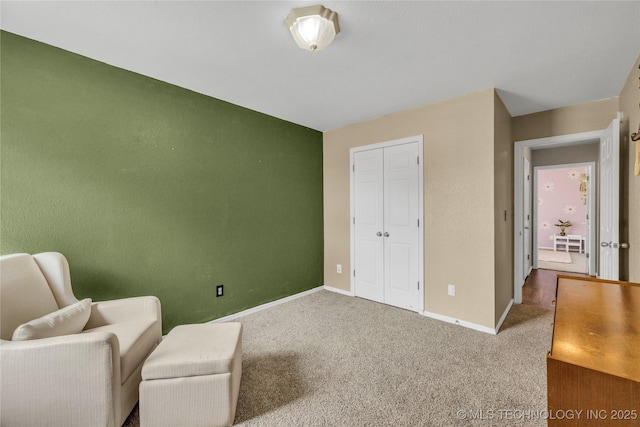 14900 E 88th St N, Owasso, OK 74055 - sitting room with carpet floors and baseboards