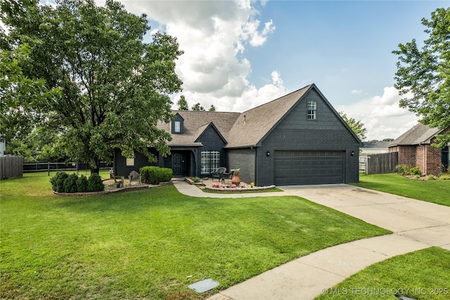 14900 E 88th St N, Owasso, OK 74055 - view of front of property featuring a garage, driveway, brick siding, and a shingled roof