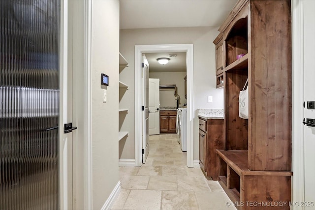 10611 N 159th E Ave, Owasso, OK 74055 - mudroom with stone tile flooring and washer / clothes dryer