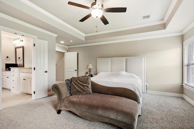 10611 N 159th E Ave, Owasso, OK 74055 - bedroom with light carpet, a raised ceiling, crown molding, ensuite bath, and a ceiling fan