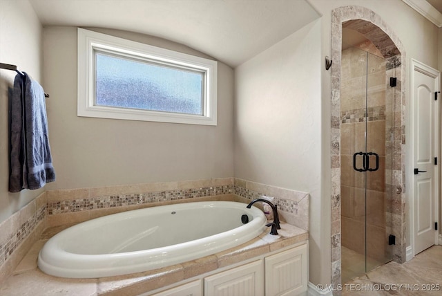 10611 N 159th E Ave, Owasso, OK 74055 - full bathroom with a garden tub, a shower stall, and vaulted ceiling