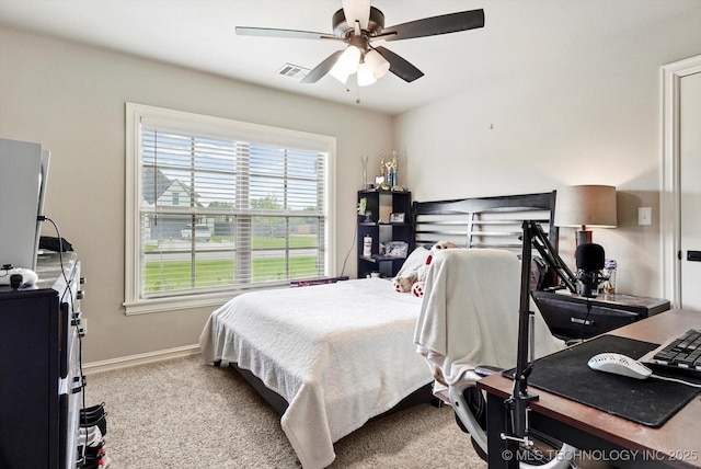 10611 N 159th E Ave, Owasso, OK 74055 - carpeted bedroom with a ceiling fan and an office area