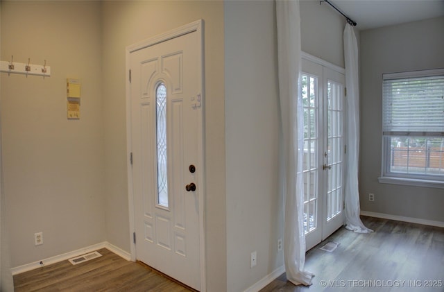 1420 S Frisco Ave Unit 6, Tulsa, OK 74119 - entryway featuring wood finished floors and plenty of natural light