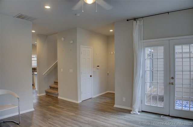 1420 S Frisco Ave Unit 6, Tulsa, OK 74119 - spare room featuring ceiling fan, wood finished floors, recessed lighting, stairway, and a smoke detector