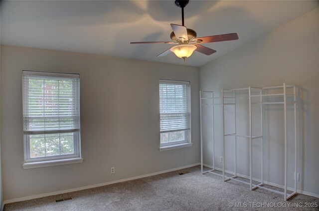 1420 S Frisco Ave Unit 6, Tulsa, OK 74119 - unfurnished bedroom with multiple windows, carpet floors, and ceiling fan