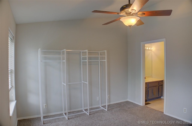 1420 S Frisco Ave Unit 6, Tulsa, OK 74119 - unfurnished bedroom with light carpet, a closet, ensuite bath, and a ceiling fan