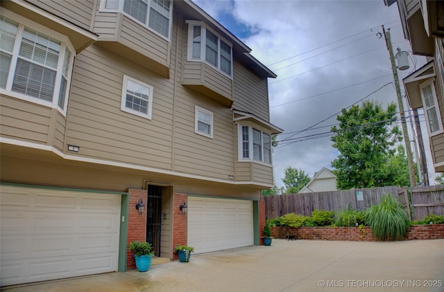 1420 S Frisco Ave Unit 6, Tulsa, OK 74119 - garage with driveway