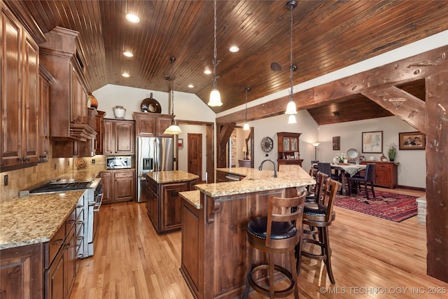 13380 S Garrett St, Sapulpa, OK 74066 - kitchen with a spacious island, stainless steel appliances, light wood-type flooring, wooden ceiling, and tasteful backsplash