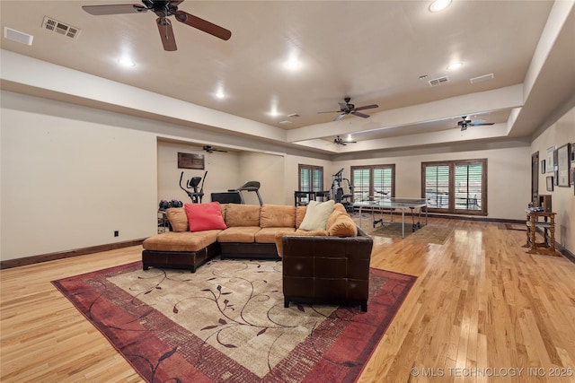 13380 S Garrett St, Sapulpa, OK 74066 - living room featuring ceiling fan, a raised ceiling, wood finished floors, and recessed lighting