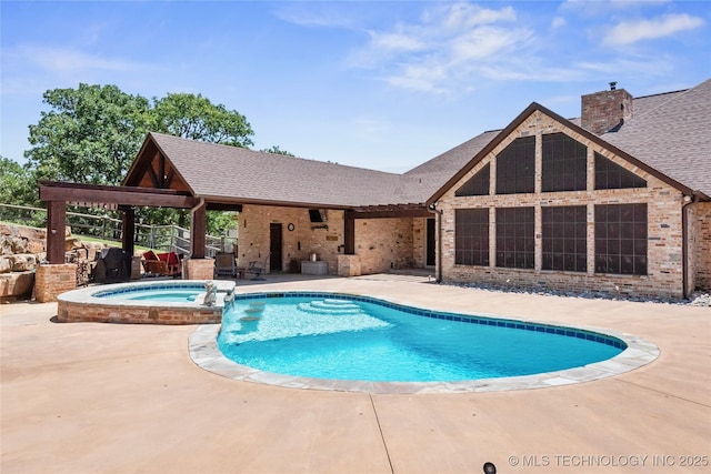 13380 S Garrett St, Sapulpa, OK 74066 - view of swimming pool featuring a patio area and a pool with connected hot tub