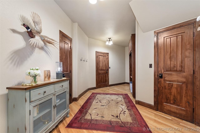 13380 S Garrett St, Sapulpa, OK 74066 - entryway with light wood-type flooring and baseboards