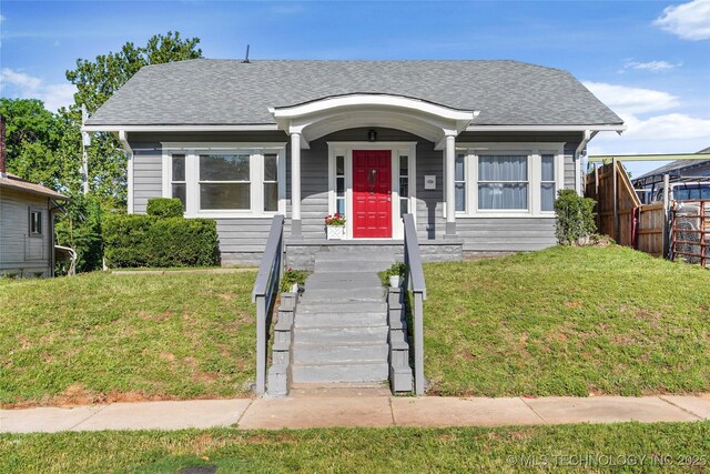 212 S Phoenix Ave, Tulsa, OK 74127 - bungalow-style house featuring a shingled roof