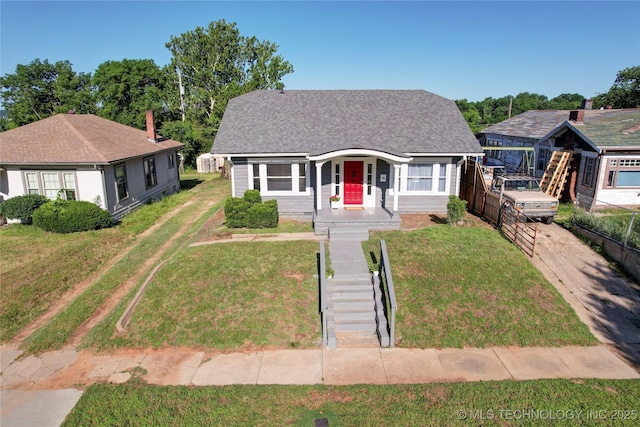 212 S Phoenix Ave, Tulsa, OK 74127 - view of front of home with a shingled roof