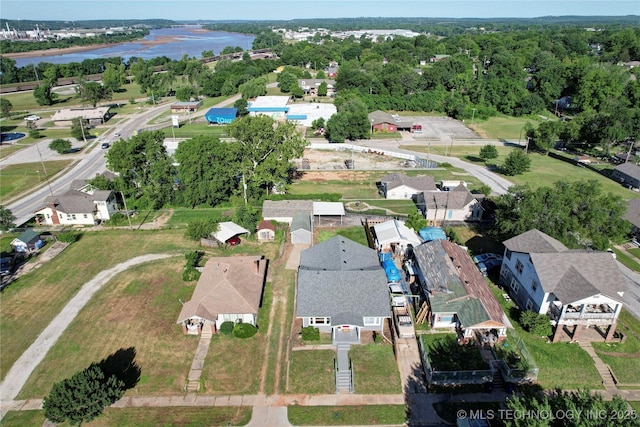 212 S Phoenix Ave, Tulsa, OK 74127 - aerial overview of property's location with nearby suburban area and a large body of water