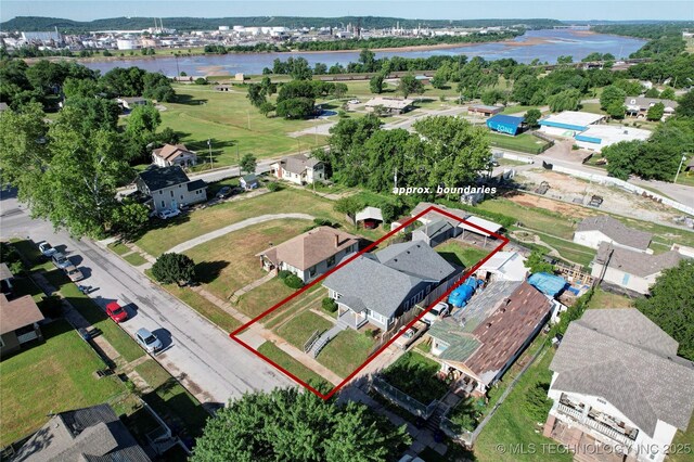 212 S Phoenix Ave, Tulsa, OK 74127 - aerial view of property and surrounding area featuring a large body of water and property parcel outlined