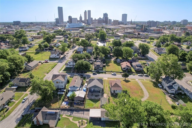 212 S Phoenix Ave, Tulsa, OK 74127 - aerial view of property and surrounding area with skyline and nearby suburban area