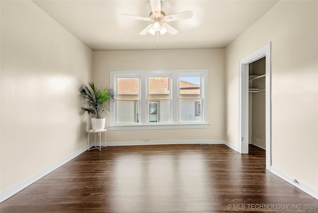 212 S Phoenix Ave, Tulsa, OK 74127 - unfurnished bedroom featuring dark wood-type flooring and ceiling fan
