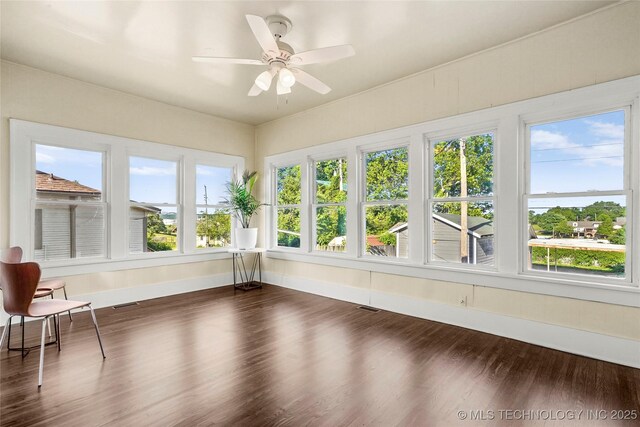 212 S Phoenix Ave, Tulsa, OK 74127 - unfurnished sunroom with wood finished floors