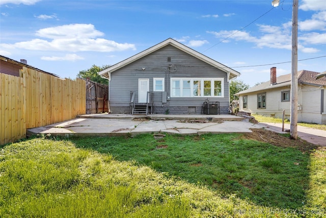 212 S Phoenix Ave, Tulsa, OK 74127 - rear view of house featuring a patio area and entry steps