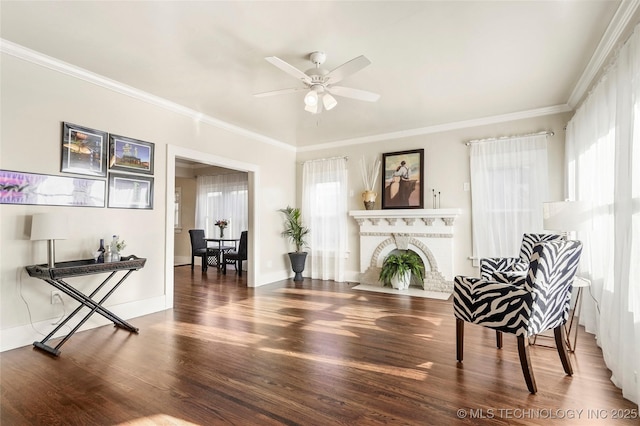 212 S Phoenix Ave, Tulsa, OK 74127 - living area with wood finished floors, ceiling fan, crown molding, and a fireplace