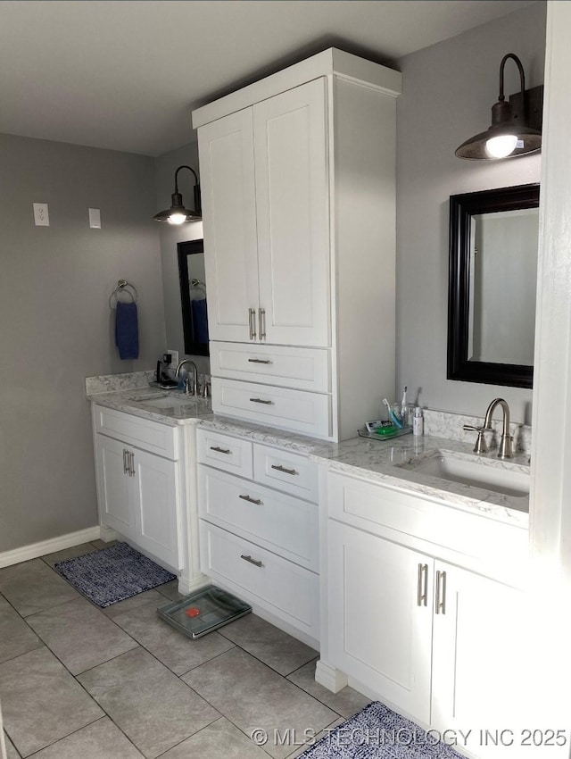 610 W Delaware St, Tahlequah, OK 74464 - bathroom with vanity and tile patterned floors
