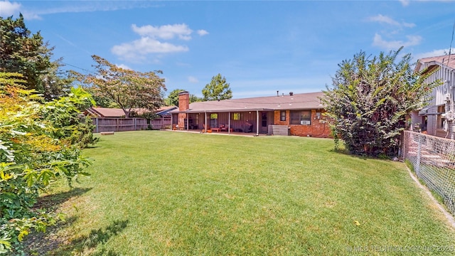 4040 E 46th Pl, Tulsa, OK 74135 - fenced backyard with a patio