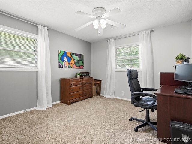 1726 Harned Dr, Bartlesville, OK 74006 - carpeted office space with ceiling fan and baseboards