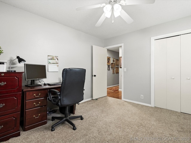 1726 Harned Dr, Bartlesville, OK 74006 - carpeted office space featuring a ceiling fan and baseboards