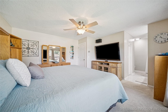 8736 E 59th St, Tulsa, OK 74145 - bedroom with a textured ceiling, carpet, and ceiling fan