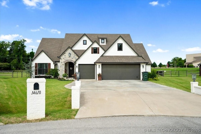 14610 N 144th E Ave, Collinsville, OK 74021 - french country inspired facade featuring concrete driveway, a shingled roof, and stone siding