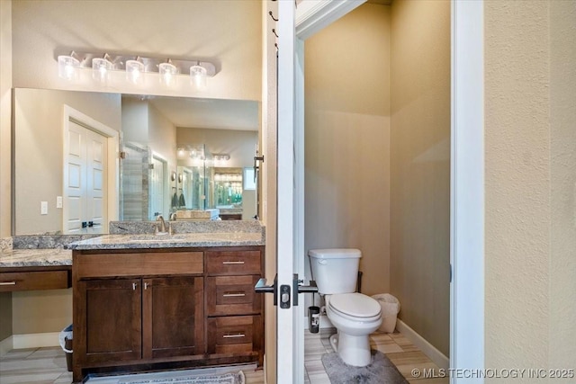 14610 N 144th E Ave, Collinsville, OK 74021 - bathroom with vanity and toilet