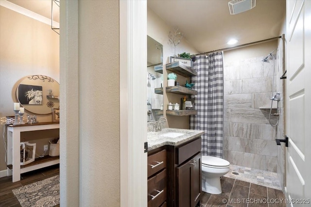 14610 N 144th E Ave, Collinsville, OK 74021 - full bath featuring wood tiled floors, vanity, and tiled shower