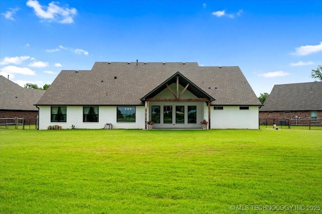 14610 N 144th E Ave, Collinsville, OK 74021 - back of house featuring a fenced backyard and a shingled roof