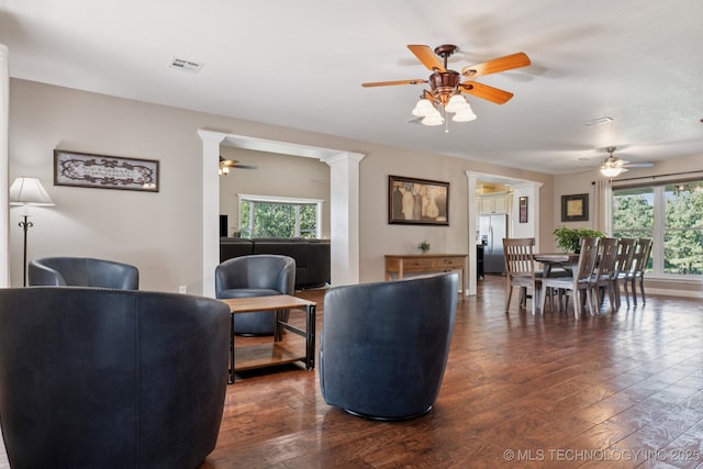 30150 S County Road 4430, Stigler, OK 74462 - living area with ceiling fan, dark wood-type flooring, and plenty of natural light