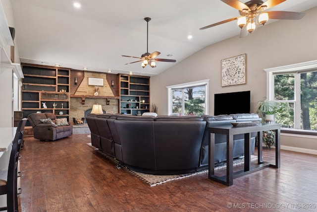 30150 S County Road 4430, Stigler, OK 74462 - living area featuring ceiling fan, recessed lighting, dark wood-style floors, lofted ceiling, and a stone fireplace