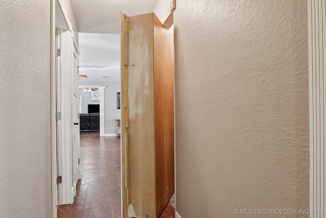 30150 S County Road 4430, Stigler, OK 74462 - hallway featuring a textured wall and wood-type flooring