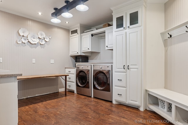 30150 S County Road 4430, Stigler, OK 74462 - laundry area with washer and dryer, cabinet space, dark wood-style floors, ornamental molding, and recessed lighting