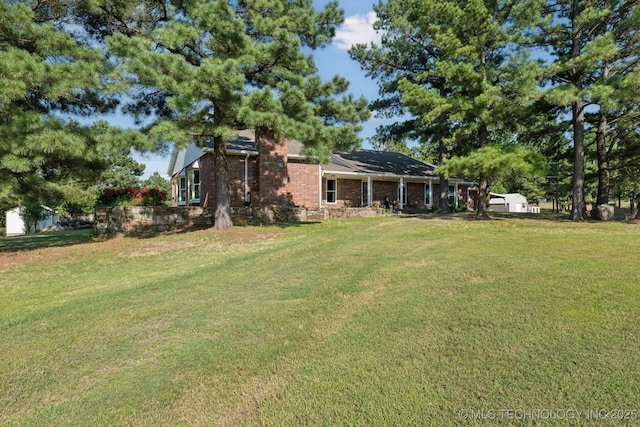30150 S County Road 4430, Stigler, OK 74462 - view of green lawn featuring a storage unit
