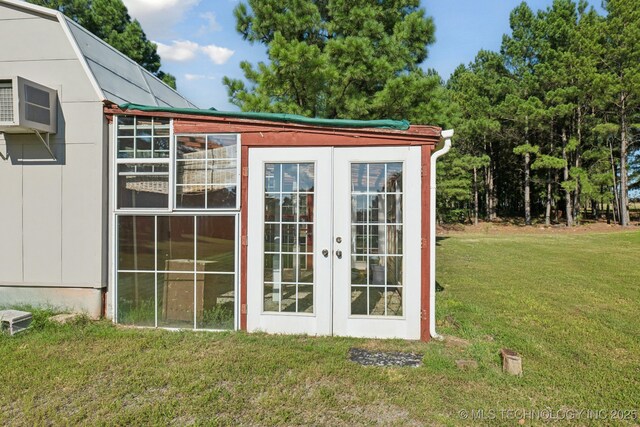 30150 S County Road 4430, Stigler, OK 74462 - view of outbuilding featuring french doors and an AC wall unit