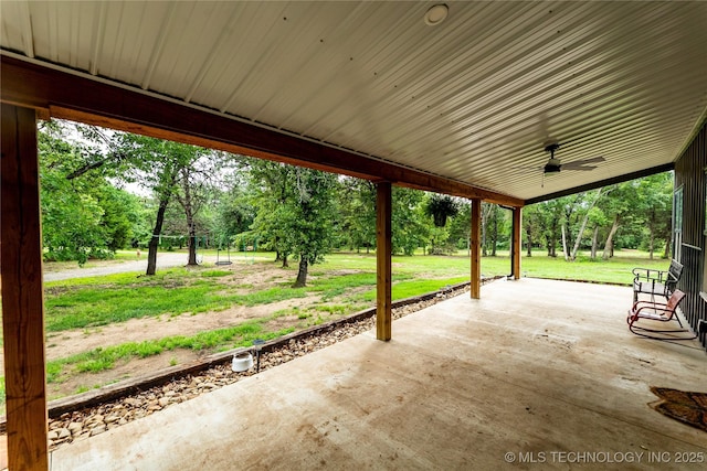 348550 E Parkside Dr, Pawnee, OK 74058 - view of patio / terrace with ceiling fan and view of wooded area