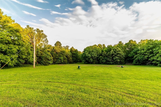 348550 E Parkside Dr, Pawnee, OK 74058 - view of grassy yard with a wooded view